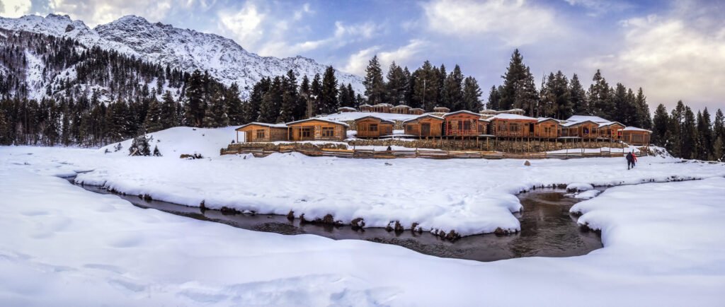 Wood Cottages in Fairy Meadows in Winter.